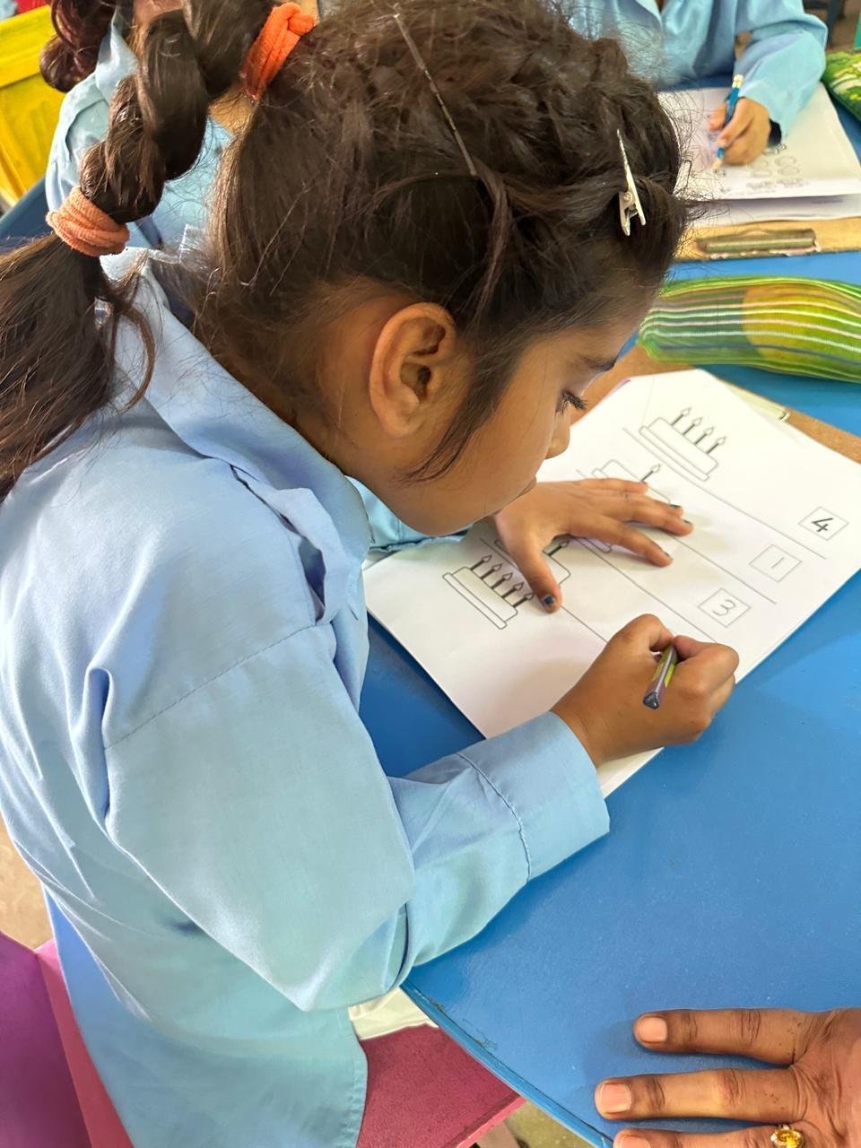 Boys studying at desks