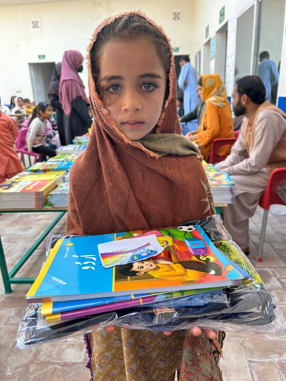 Girl with school supplies